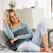 Image of a woman warming her tummy area with Beurer HK 123 XXL