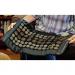 Image of user holding UTK Far Infrared Pad Pro Small
